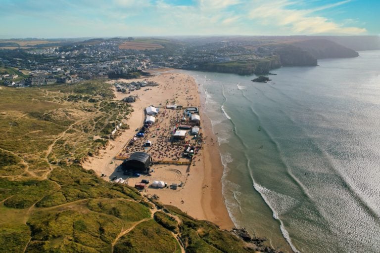 Aerial photo of Tunes in the Dunes festival on Perrranporth Beach